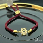 دستبند-مارشال-زرشکی-با-پلاک-طلای-گل